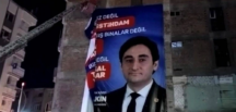 Saadet parti adayının pankartını AKP li belediye indirdi